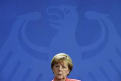 Меркель: Трехсторонняя контактная группа должна продолжить работу в действующем формате