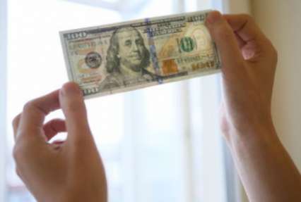 НБУ заметно поднял курс доллара