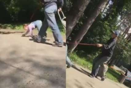 Полиция разыскивает женщину, которая выгуливала ребенка на поводке (видео)