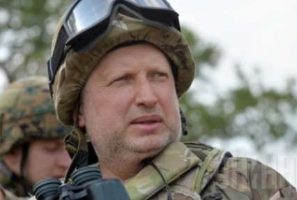 Украинский интерес. Воинственный Турчинов, обострение на Донбассе и обмен санкциями