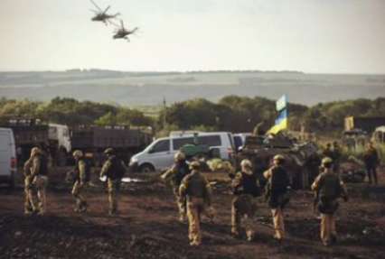 Война на Донбассе год спустя: ужасные жертвы, супергерои и перспективы мира (фото,видео)