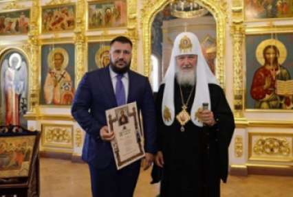 Патриарх Кирилл наградил грамотой министра Януковича Клименко